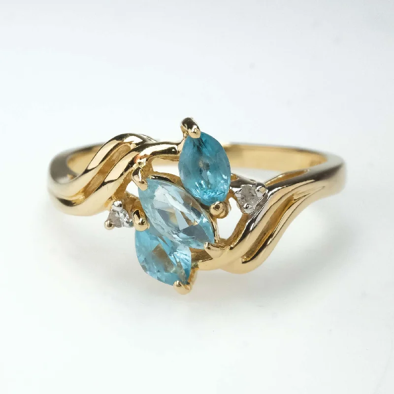 Rose gold engagement rings-0.57ctw Blue Topaz with Diamond Accents Gemstone Ring in 14K Yellow Gold