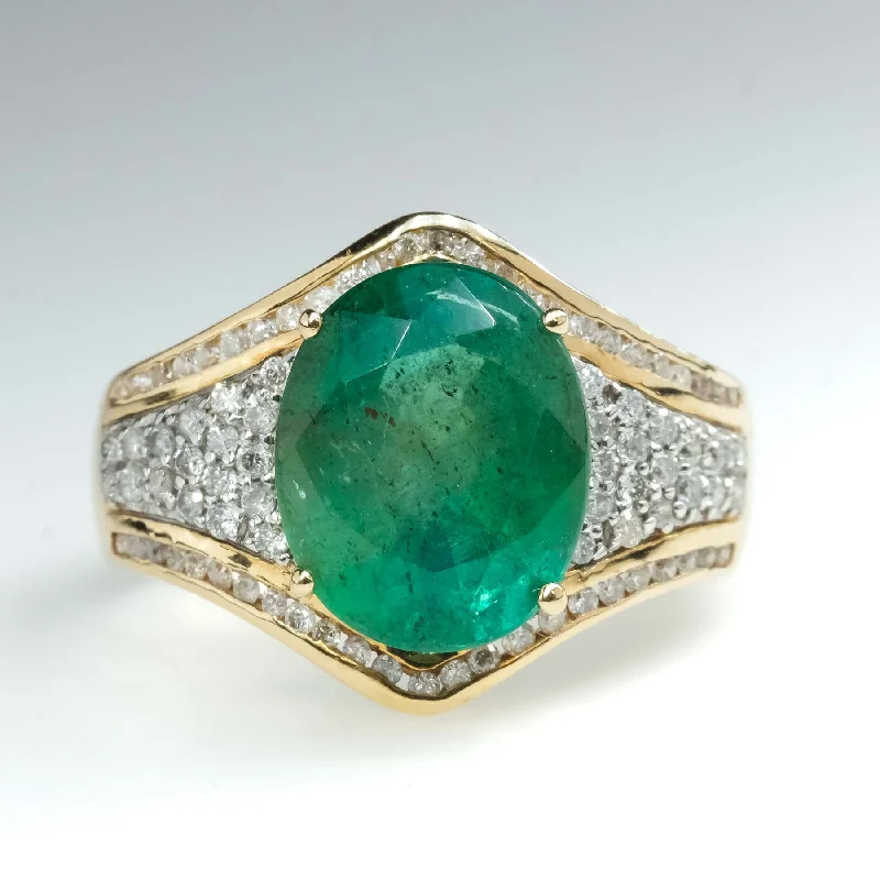 Open frame engagement rings-3.67ct Oval Natural Emerald and Diamond Accented Ring in 14K Yellow Gold