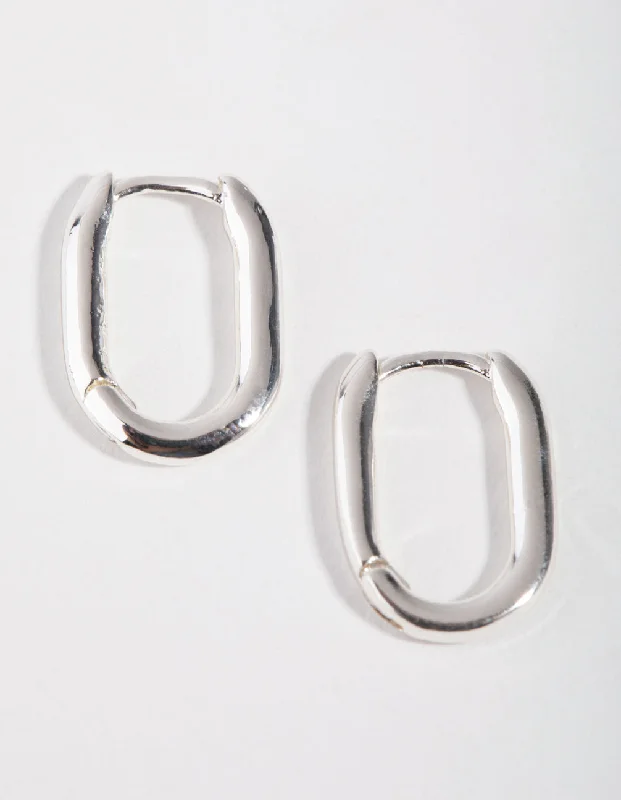 Fine bead earrings-Sterling Silver Sleek Oval Huggie Earrings