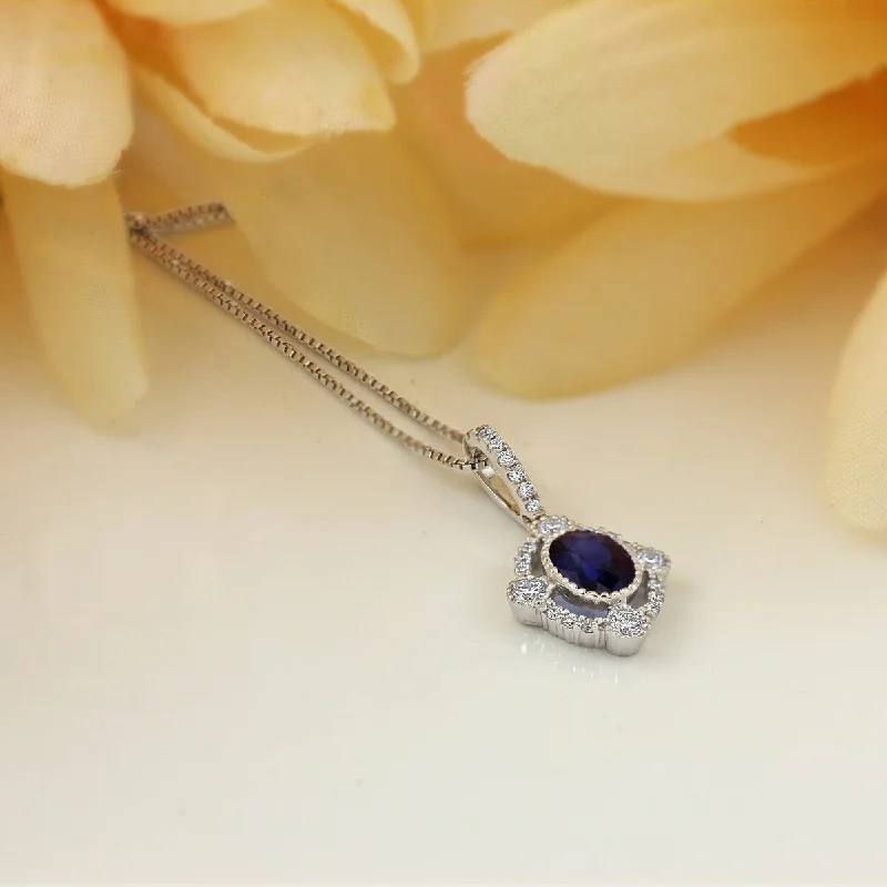 Haze glass necklaces-Auriya Fancy Oval Shaped 9/10ct Royal Blue Sapphire and 1/3ctw Halo Diamond Necklace 18k Gold